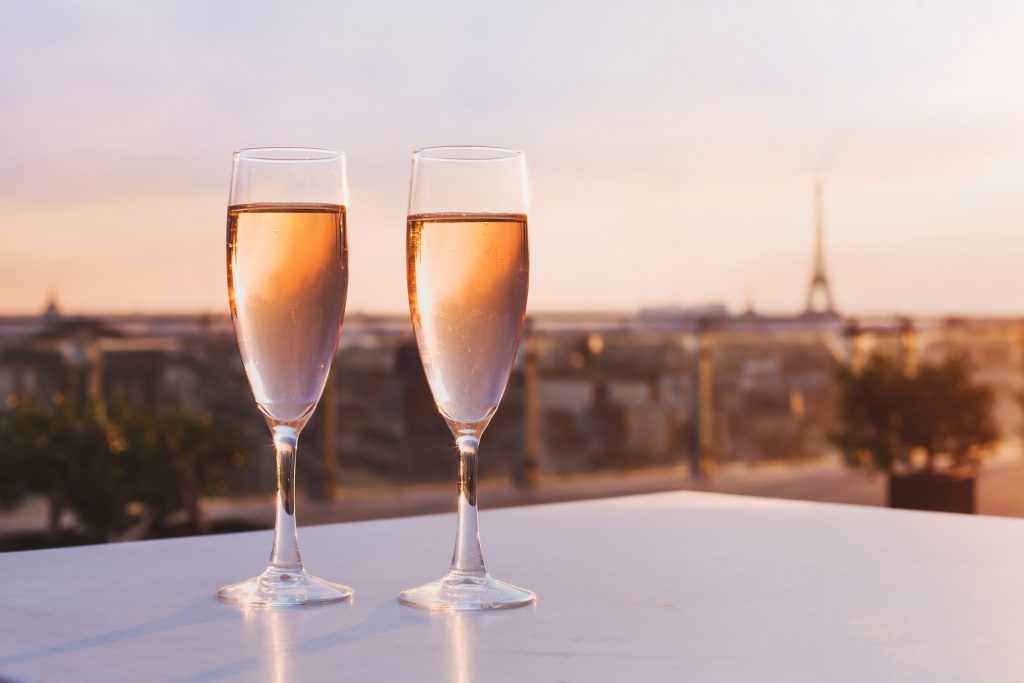 two glasses of champagne with Eiffel tower in the background