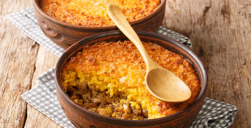 Chilean shepherd's pie, pastel de choclo tops spiced ground beef with a puréed corn crust - Viking Travel