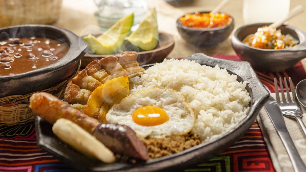 Typical rice dish, Bandeja Paisa, from Colombia - Viking Travel