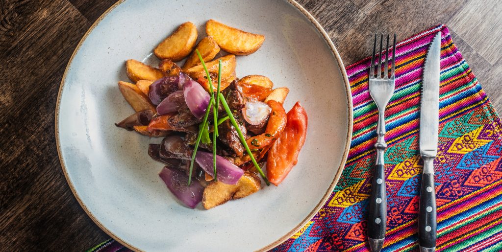 Lomo saltado traditional peruvian plate - Viking Travel