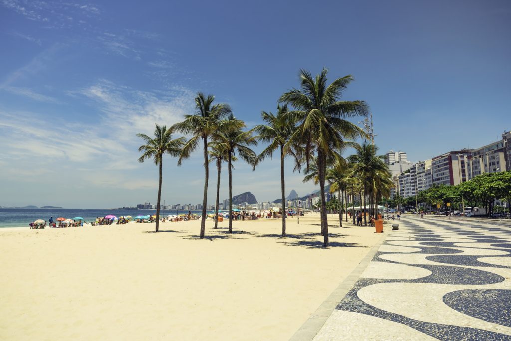 Palms on Copacabana Beach next to landmark mosaic in Rio de Janeiro, Brazil - Viking Travel