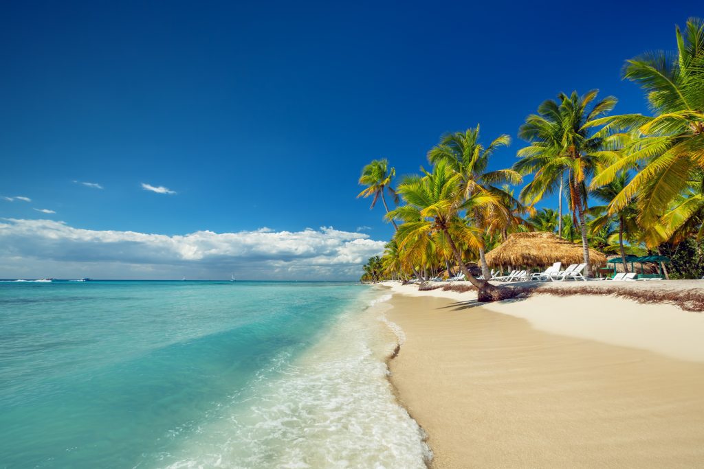 Landscape of paradise tropical Caribbean island beach with perfect sunny sky - Viking Travel